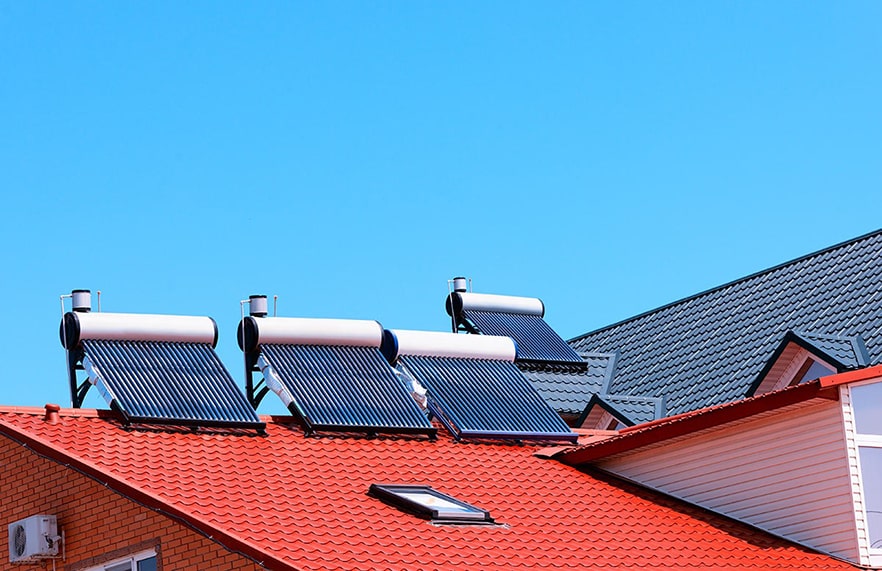 Solar Power Panels on a Red Roof — Solar Power Services in Brisbane, QLD