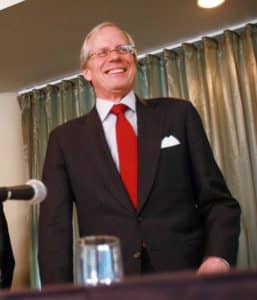 A Man with Red Tie — Solar Power Services in Brisbane, QLD