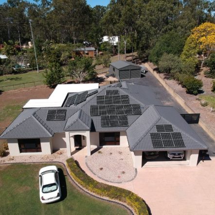 Top View Of Big House With Solar — Solar Power Services in Brisbane, QLD