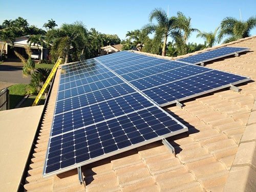 Solar Panels on a Beige Roof — Solar Power Services in Brisbane, QLD